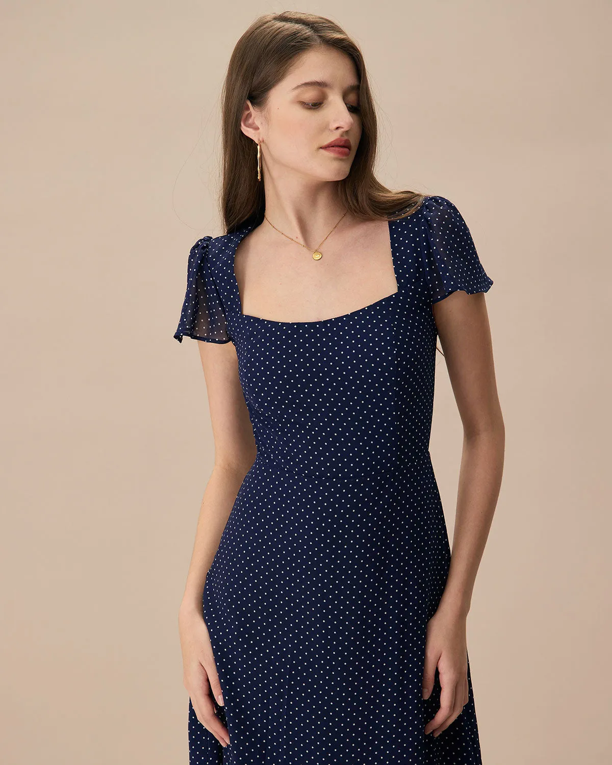 The Navy Polka Dot Cutout Midi Dress