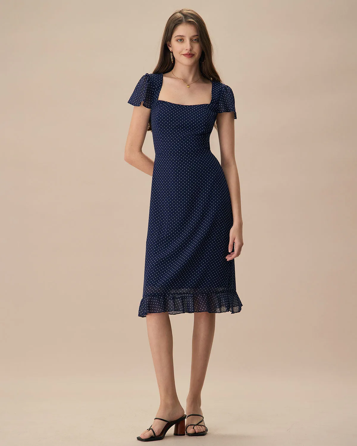 The Navy Polka Dot Cutout Midi Dress